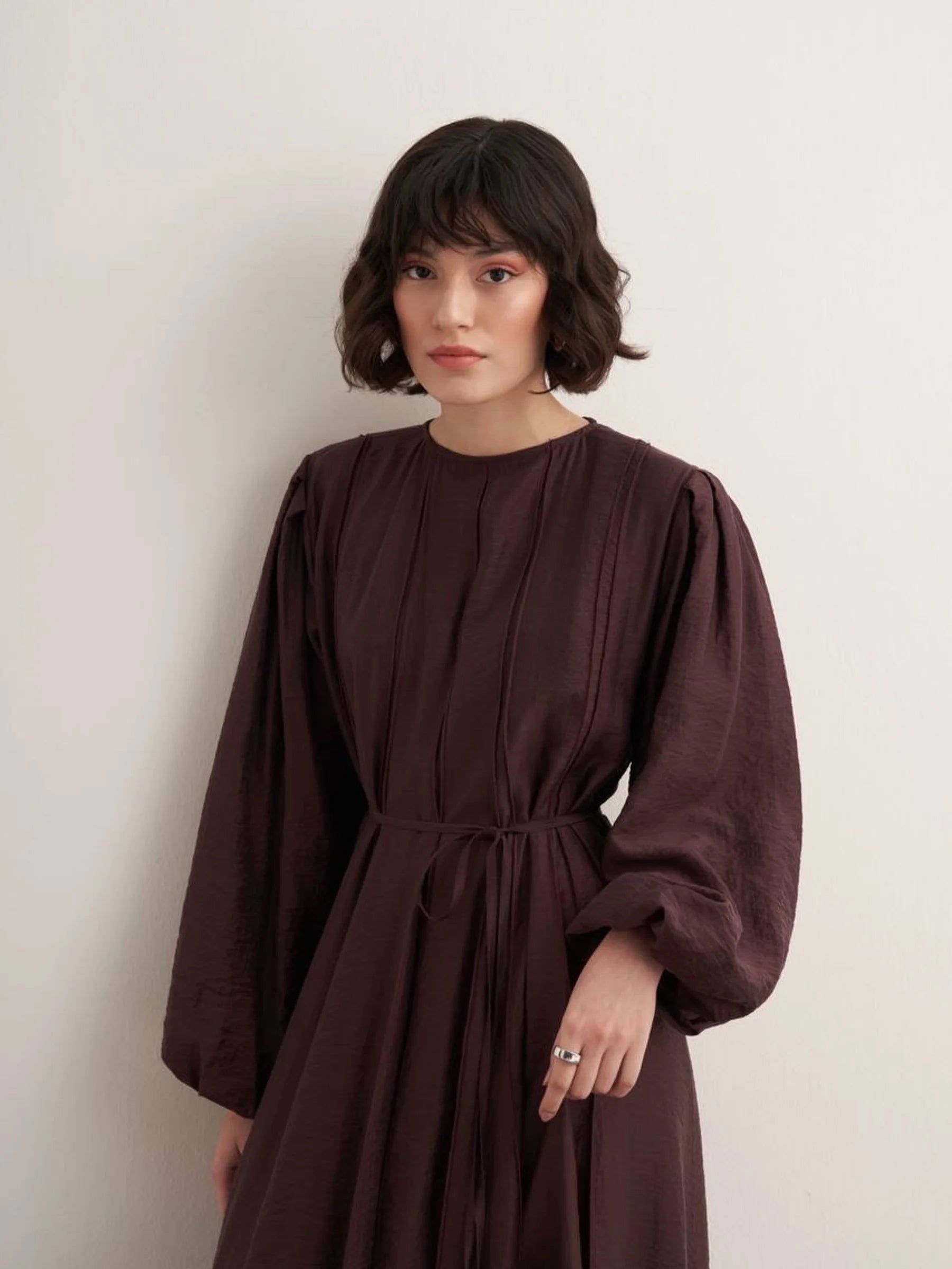Maria Pleated Dress in Plum by Muserobe, side view
