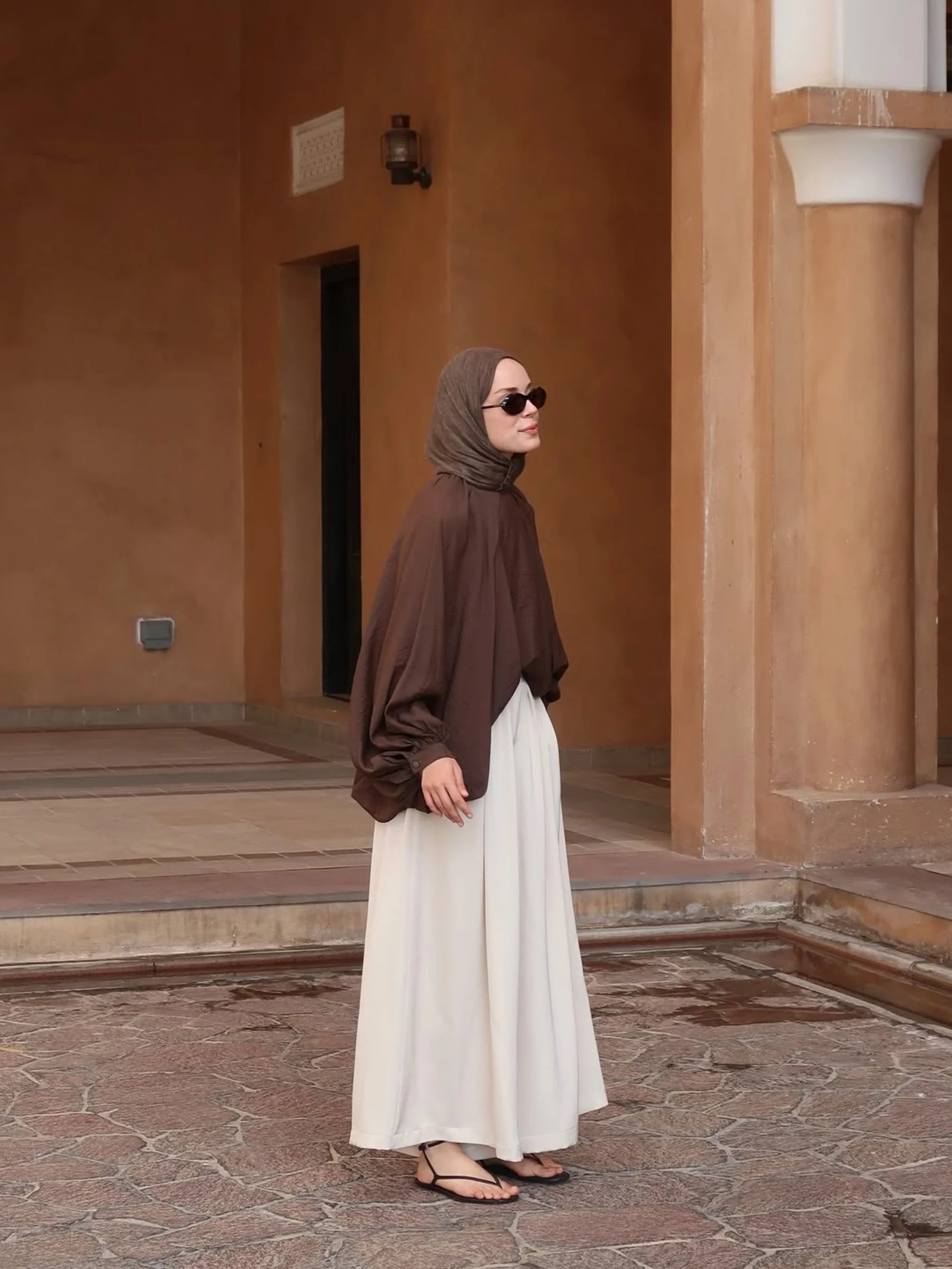 Samra Wide-Leg Trousers in Cream by Muserobe, back view